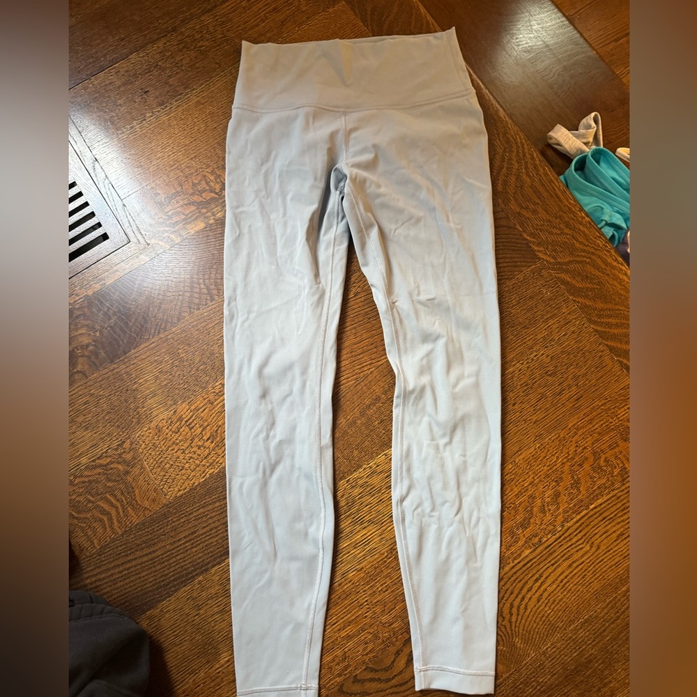 Lululemon, no longer sold grayish blue colored leggings, size 8
